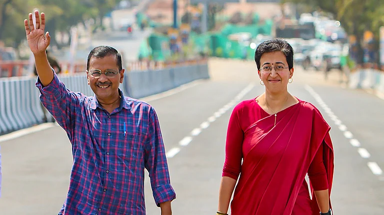 New Delhi: Delhi Chief Minister Arvind Kejriwal with state Cabinet Minister Atishi | - PTI